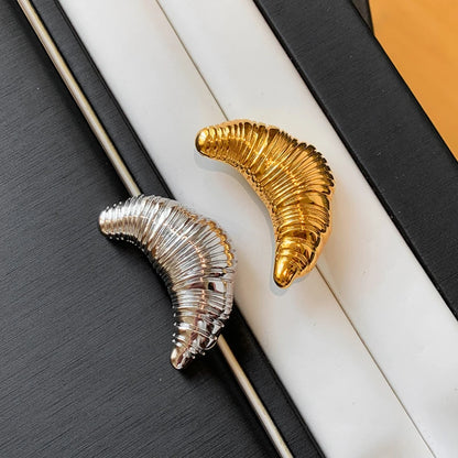 The Croissant Pin: Your Tiny Luxury Touch