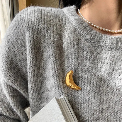 The Croissant Pin: Your Tiny Luxury Touch