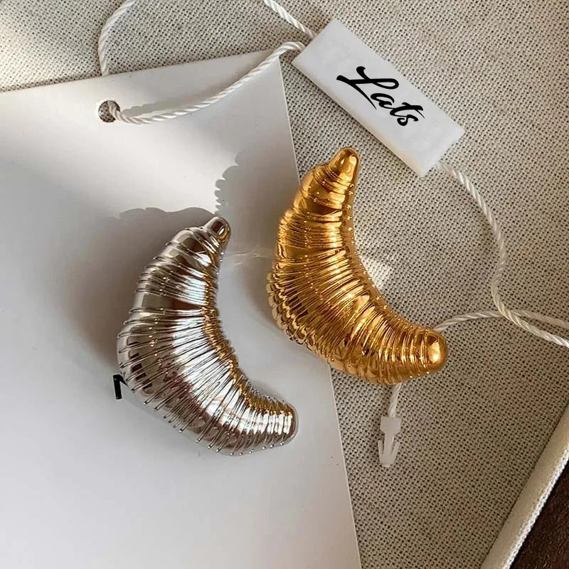 The Croissant Pin: Your Tiny Luxury Touch