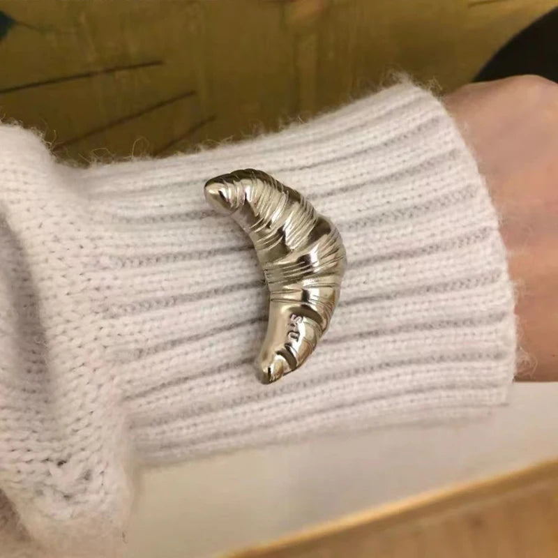 The Croissant Pin: Your Tiny Luxury Touch