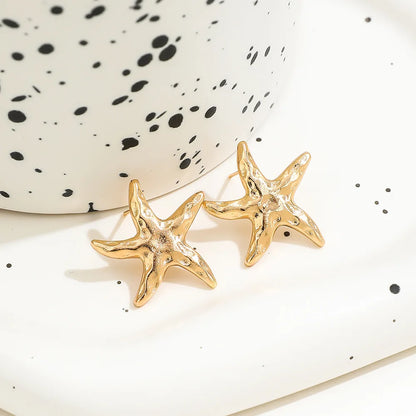 "Rebel Tide" Gold Starfish Studs