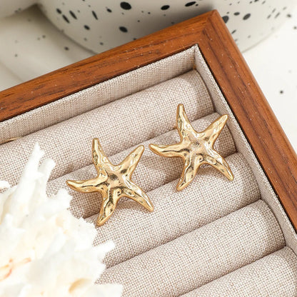 "Rebel Tide" Gold Starfish Studs