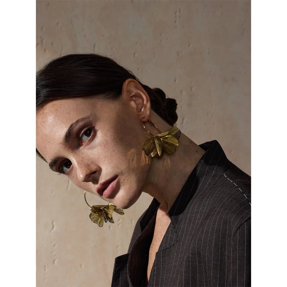 Gold flower earrings - PVD gold plated big hoop statement design | Pure Vita Dubai